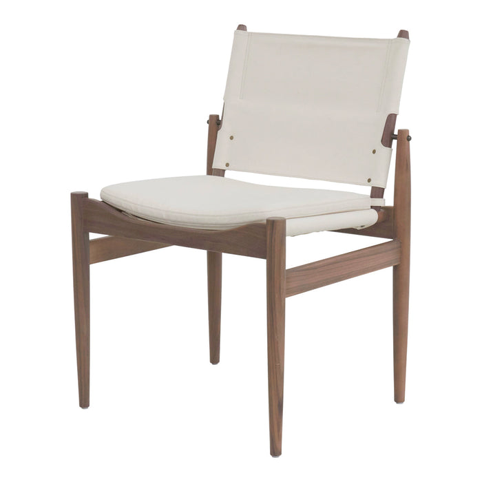 White cushioned chair with a walnut wood frame, minimalist design and natural tones, perfect for modern decor.