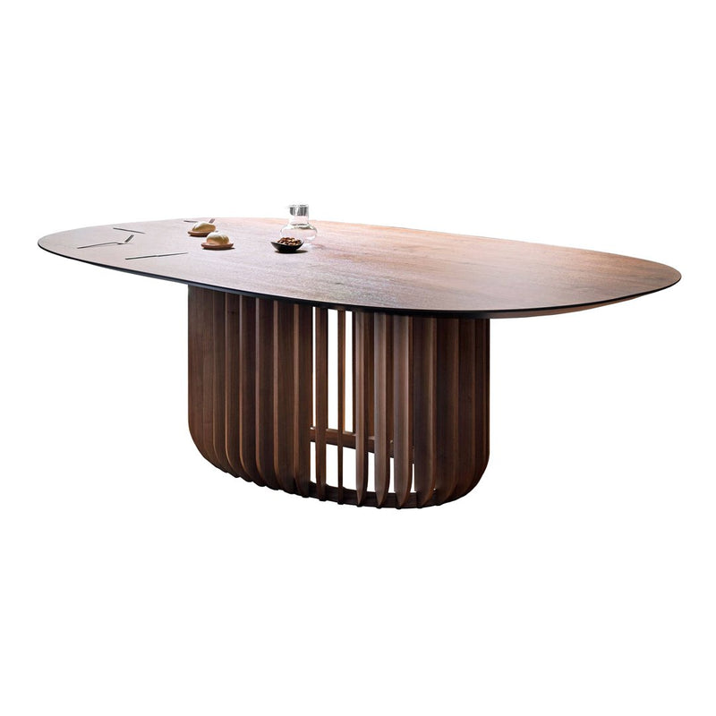 Elegant oval wooden dining table with a smooth, warm brown finish and stylish slatted base design.