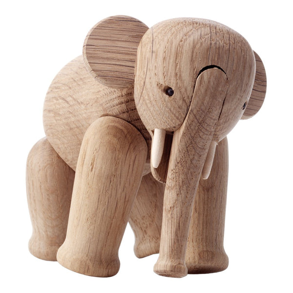 Natural wooden elephant toy in light oak finish, featuring smooth, rounded shapes and minimalistic design.