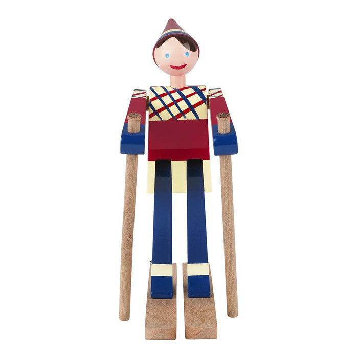 Colorful wooden figure with red, blue, and yellow hues featuring a diamond pattern on its shirt.