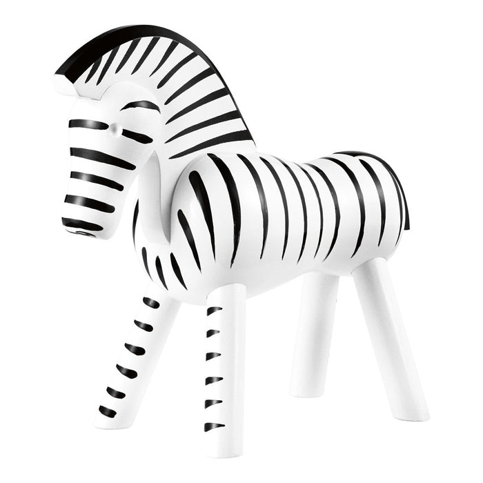 Black and white striped decorative zebra figurine with sleek, modern design and playful pattern.