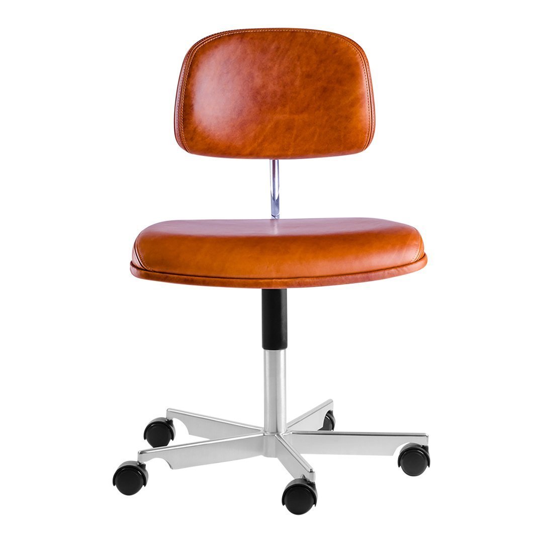 Brown faux leather office chair with a sleek chrome base and smooth black casters. Modern and stylish design.
