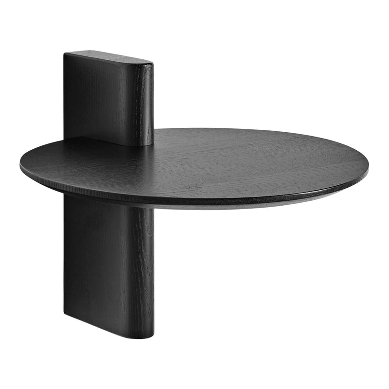 Sleek black round side table with a unique geometric design and smooth surface finish. Modern and minimalist aesthetic.