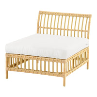 Natural rattan chair with a minimalist design, featuring a light beige cushion and a sleek, open slat pattern.