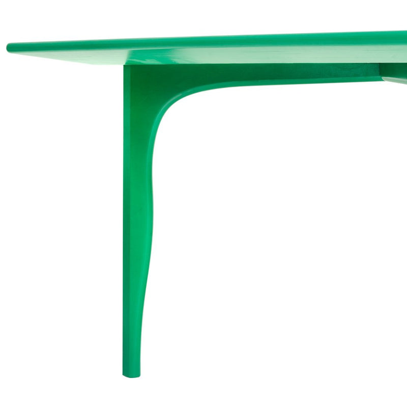 Vibrant green tabletop with sleek, curved legs, showcasing a modern and minimalist design.