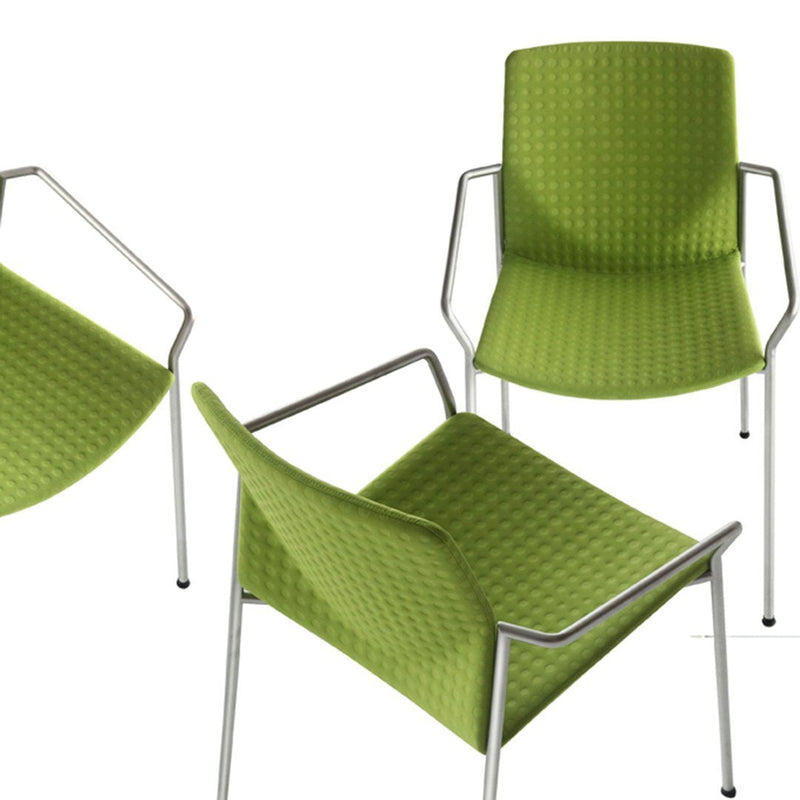 Bright green chairs with a textured pattern and sleek silver legs, perfect for modern decor.