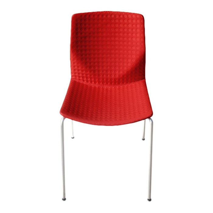 Bright red chair with a textured pattern and sleek silver legs, perfect for modern decor.