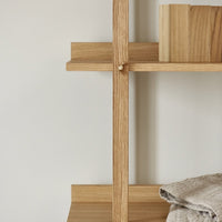 Light oak shelving with neutral tones and subtle wood grain texture, featuring clean lines and minimal design.
