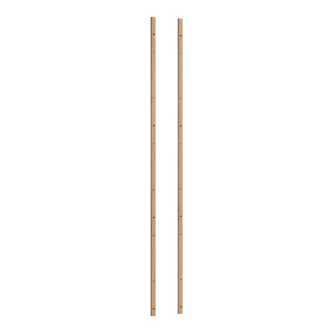 Natural bamboo sticks with a smooth texture and light tan color, featuring a simple, uniform pattern.