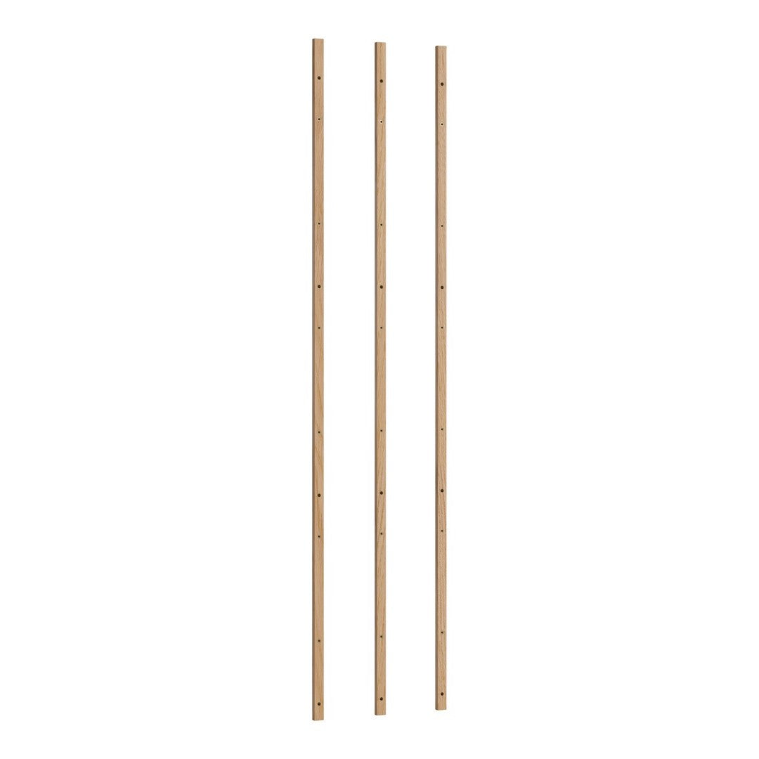 Three natural bamboo stakes with a smooth, light brown finish, showcasing a classic bamboo pattern.