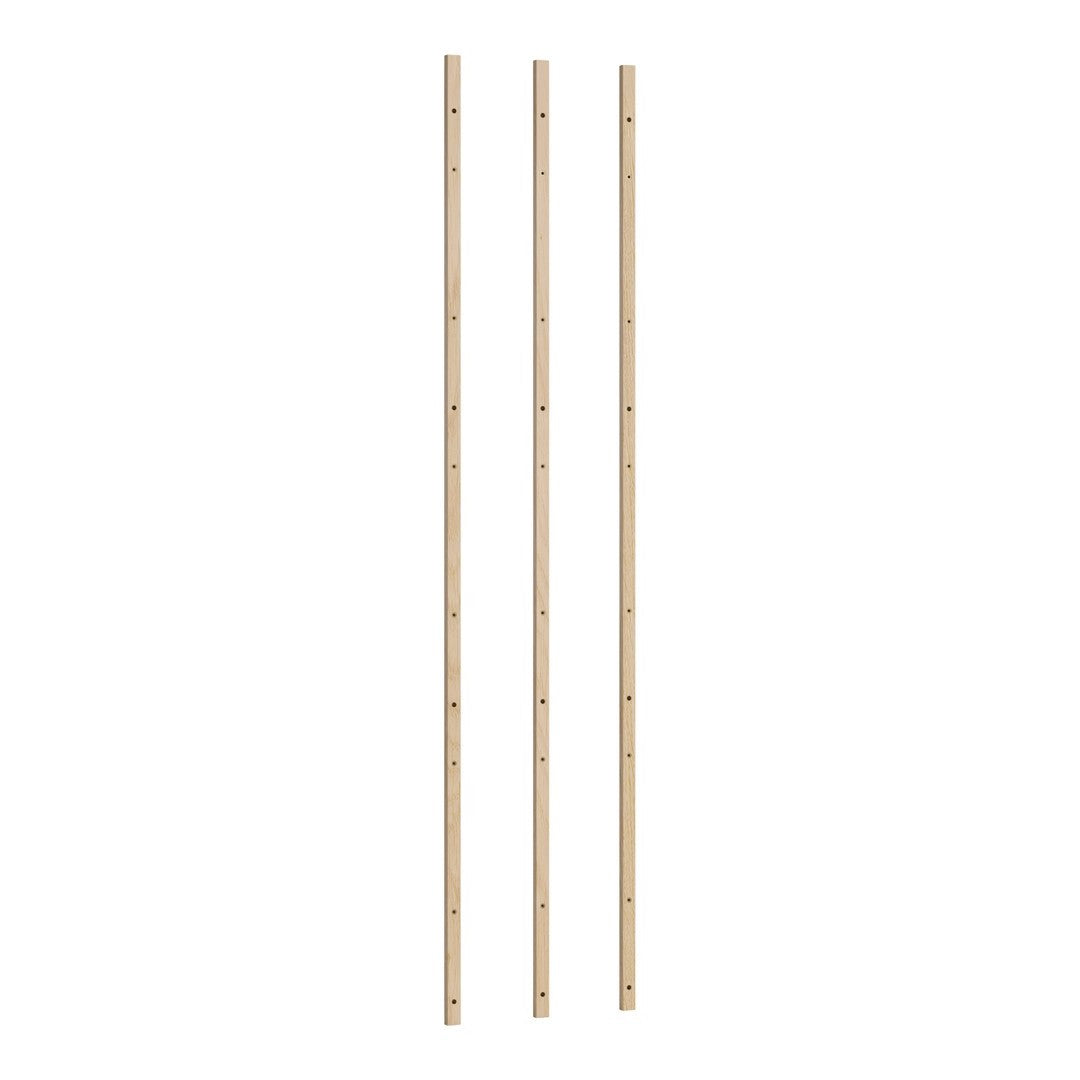 Three wooden bamboo poles with a light natural finish and subtle texture, perfect for garden support.