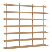 Light maple wood shelving unit with a minimalist design and vertical-horizontal pattern. Ideal for modern decor.