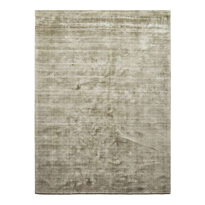 Soft, muted grey area rug with subtle texture and a minimalist design, perfect for modern decor.