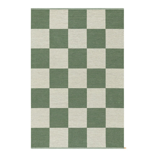 Green and cream checkerboard rug with a bold, geometric pattern. Ideal for modern decor.