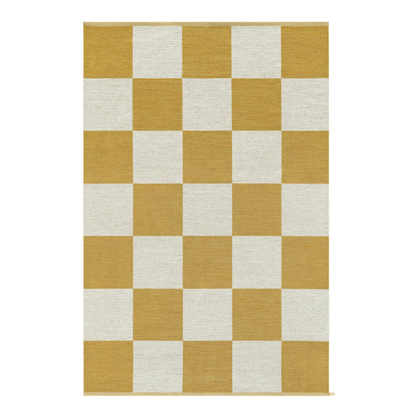 Yellow and white checkerboard patterned rug, perfect for adding a bold touch to any space.