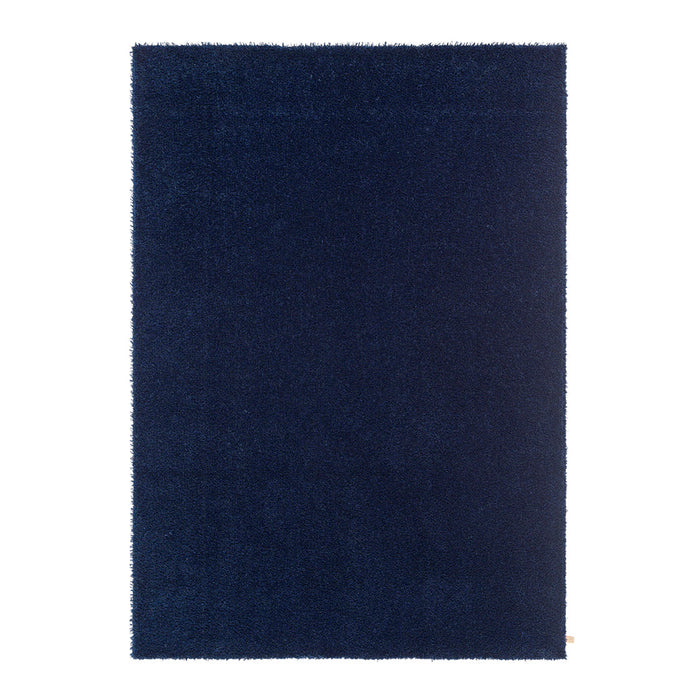 Navy blue textured area rug with a solid, plush surface, perfect for adding warmth to any space.