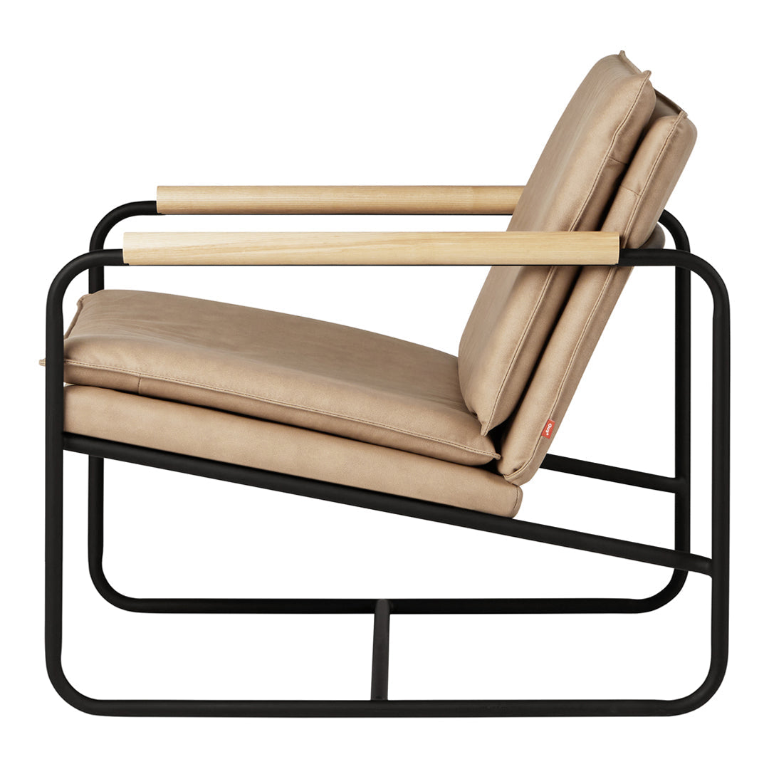 Beige cushioned chair with a sleek black metal frame and light wood armrests, showcasing a minimalist design.