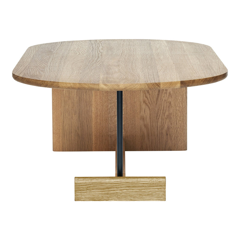Light oak table with a smooth finish and contrasting black metal base, featuring a modern, minimalist design.