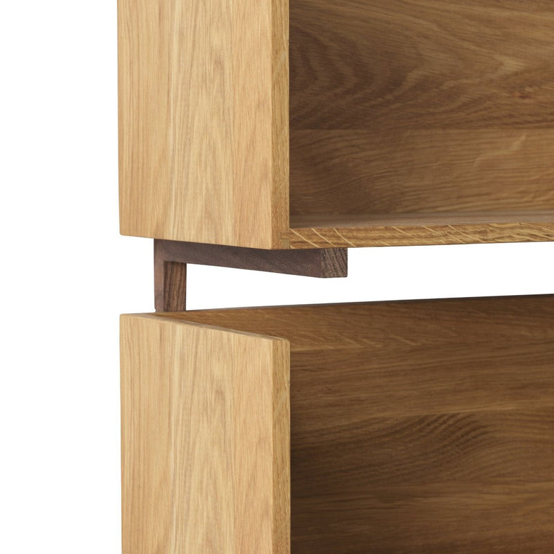 Wooden shelf featuring natural oak color with smooth, clean lines and subtle grain patterns. Perfect for modern spaces.