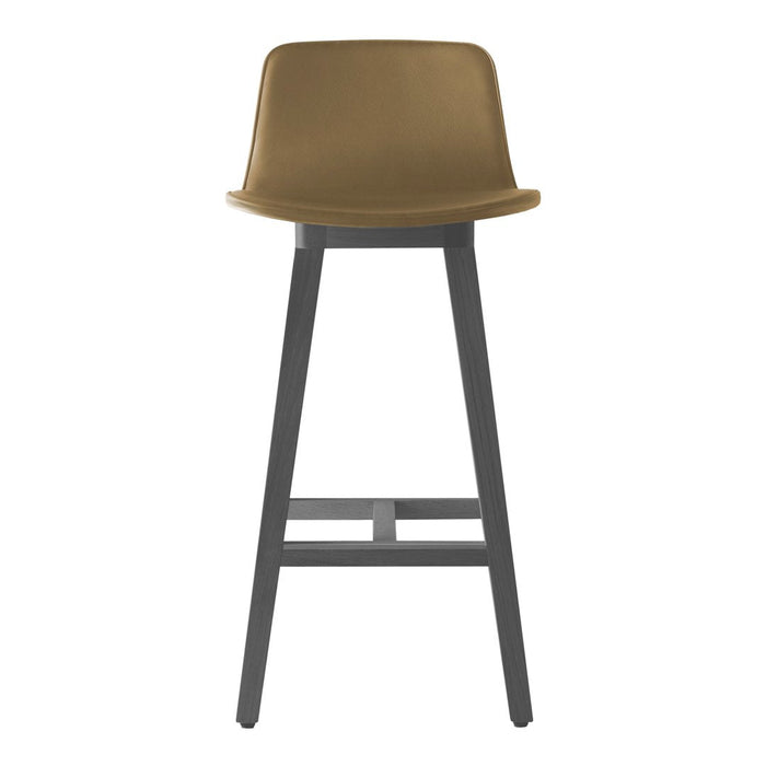 Tan bar stool with a smooth seat and black wooden legs, featuring a minimalist design and clean lines.