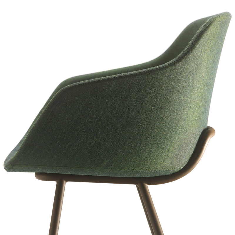 Green upholstered chair with a subtle texture and sleek, modern design. Perfect for contemporary interiors.