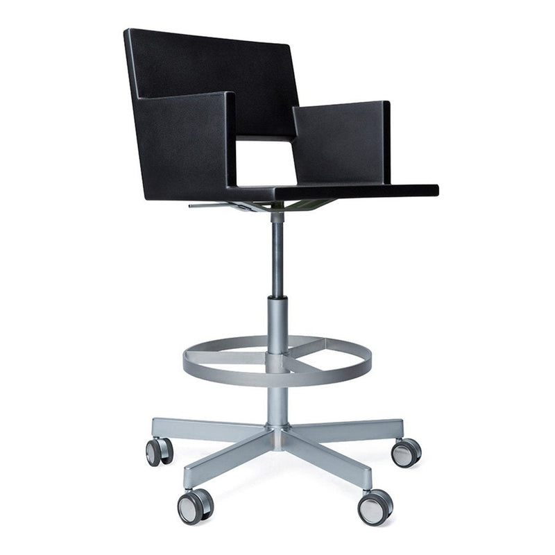 Sleek black faux leather barstool with minimalist design and brushed silver metal base. Perfect for modern decor.