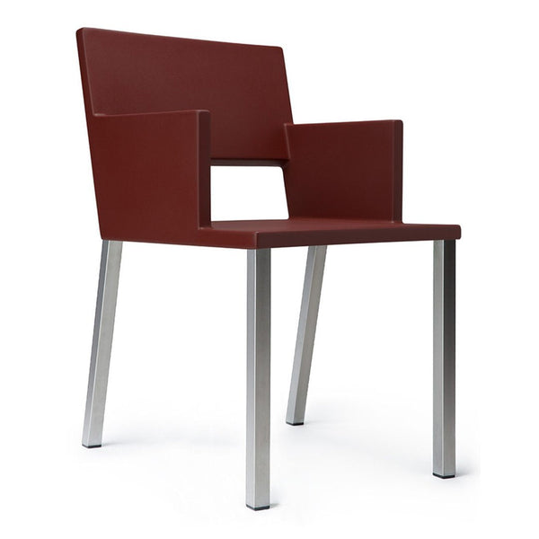 Modern red chair with minimalist design and silver legs. Sleek, contemporary style for any space.