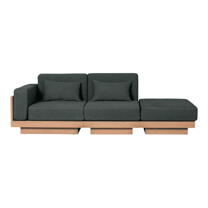 Stylish dark gray fabric sofa with clean lines and a light wood base, perfect for modern living spaces.