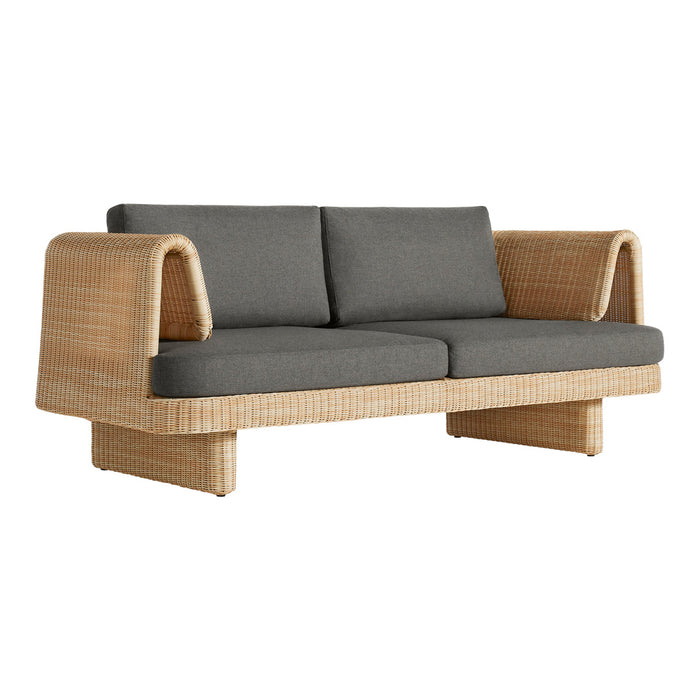 Natural rattan sofa with gray cushions, featuring a modern, minimalist design. Perfect for stylish living spaces.