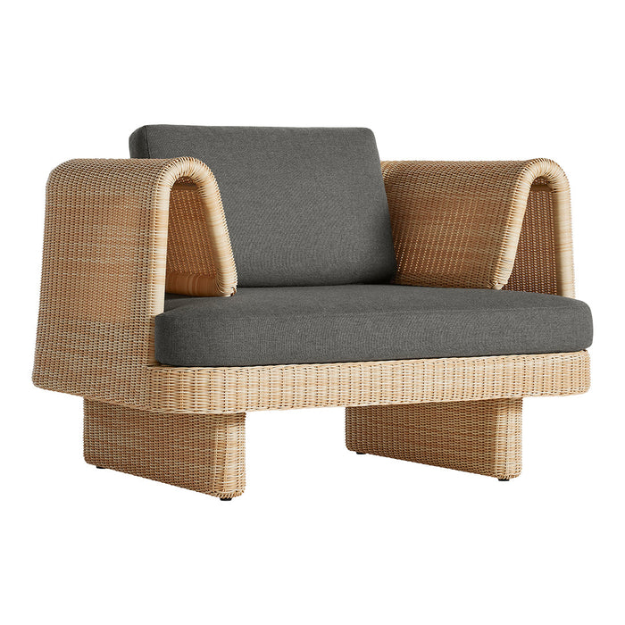 Rattan chair with gray cushions, featuring a unique woven pattern and natural tones for a modern look.