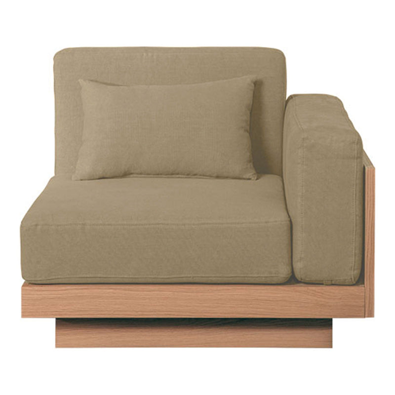 Beige upholstered corner chair with a matching cushion and a light wooden base, featuring smooth, minimalist design.