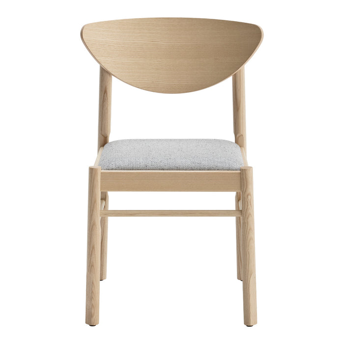 Natural wood chair with a light beige cushion and a unique curved back design. Modern, minimalist style.