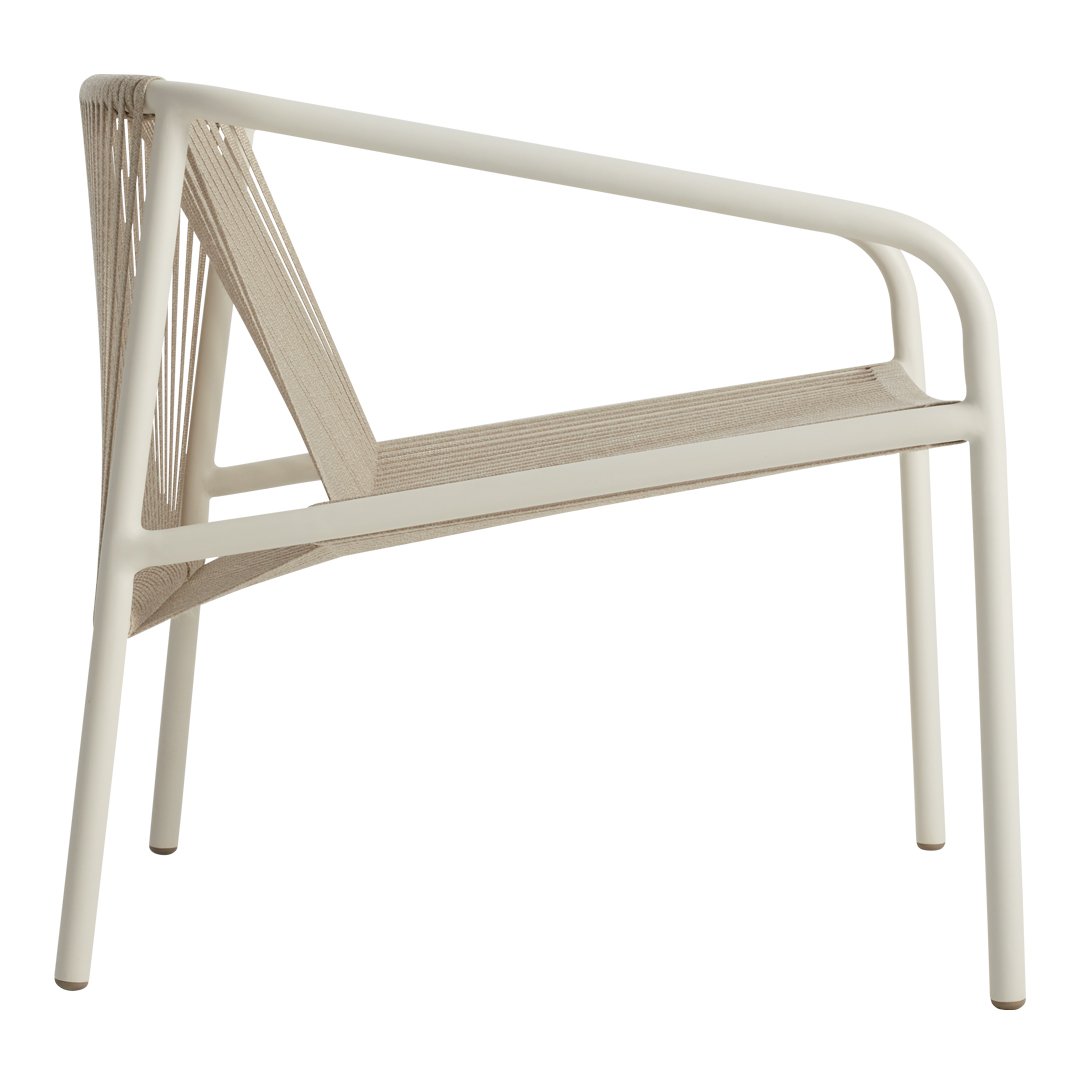 White and beige outdoor lounge chair with a minimalist design and woven pattern. Perfect for modern patios.