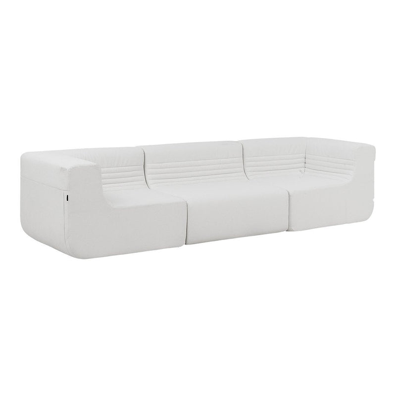 Modern white sofa with sleek lines and subtle horizontal ribbed pattern for a minimalist touch.