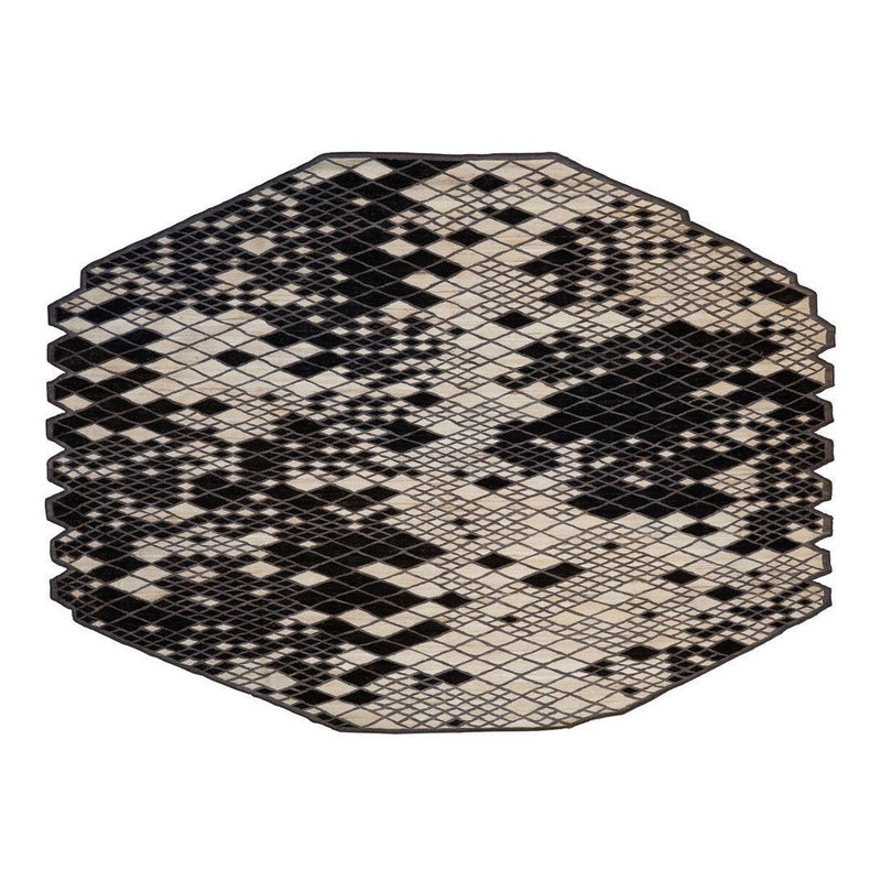 Black and white octagonal rug with a pixelated geometric pattern. Ideal for modern decor.