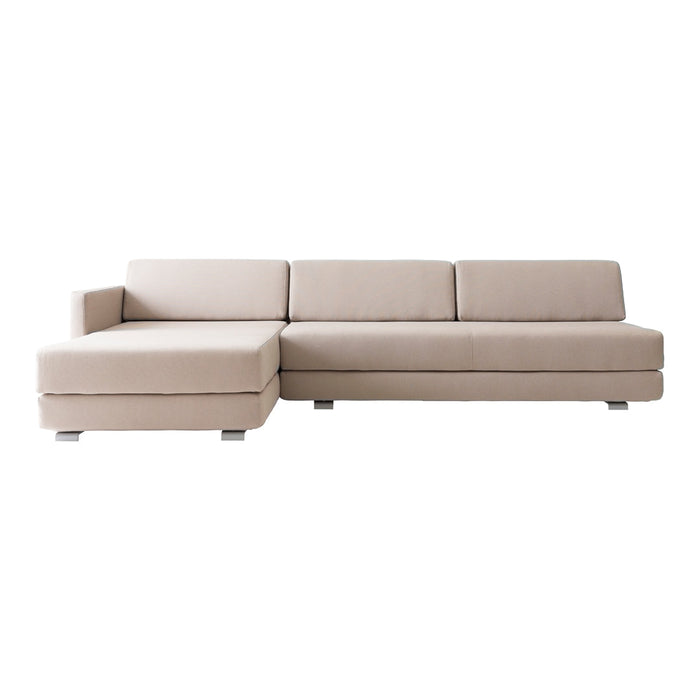 Light beige sectional sofa with clean lines and a modern, minimalist design. Perfect for any contemporary living space.