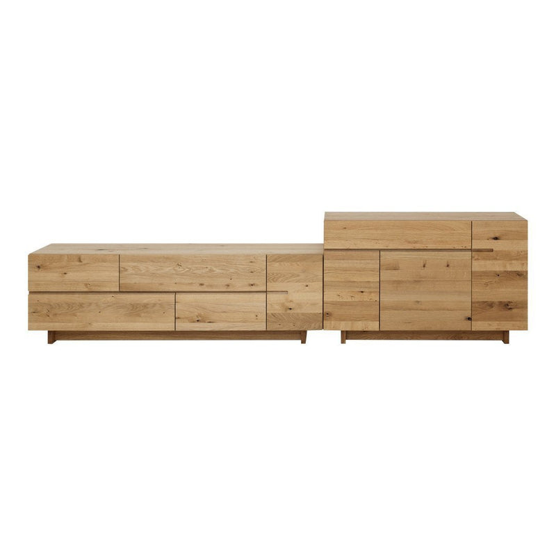 Natural wood sideboard with a light oak finish, featuring sleek, minimalist design and various textured panel patterns.