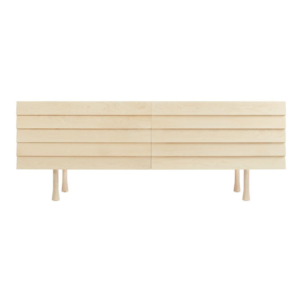 Light natural wood TV stand with slatted design and minimalistic legs, showcasing a clean and modern aesthetic.