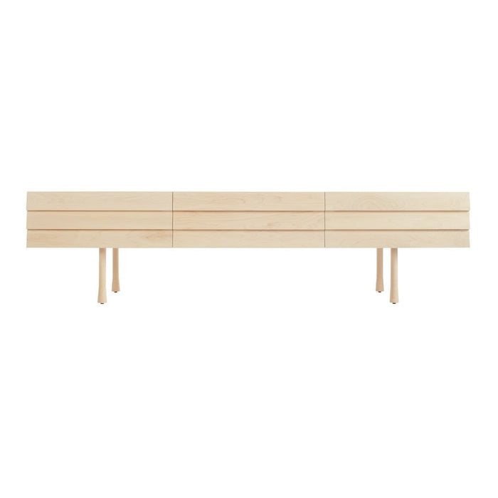 Light wood sideboard with a smooth, minimalist design and horizontal slat pattern. Perfect for modern decor.