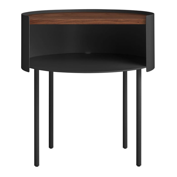 Black round side table with a wood-grain top and sleek metal legs, showcasing a modern minimalist design.