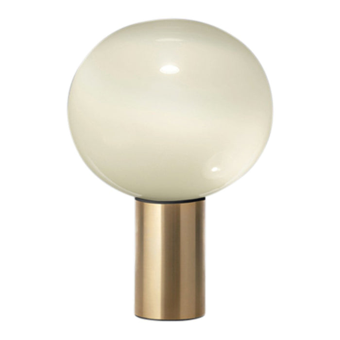 Round frosted glass lamp with a sleek gold base, featuring a minimalist design and soft neutral colors.
