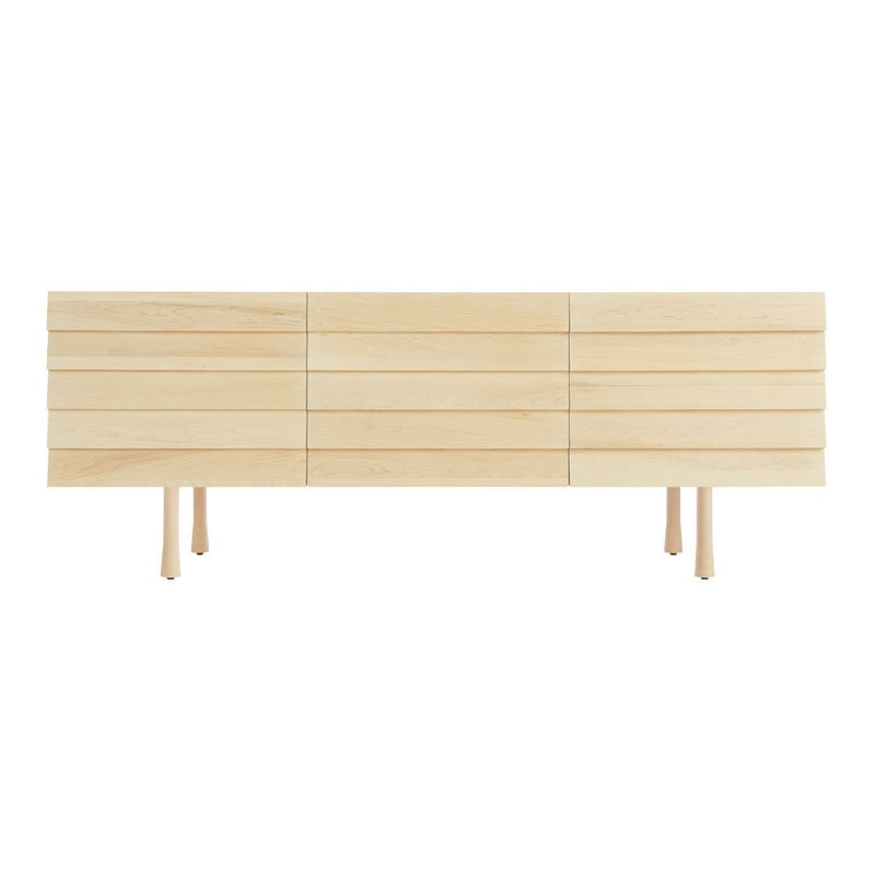 Light natural wood cabinet with a sleek, minimalist design and horizontal paneling details.