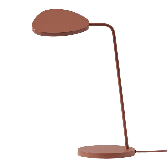 Modern copper desk lamp with a sleek, curved shade and minimalist design, perfect for stylish decor.
