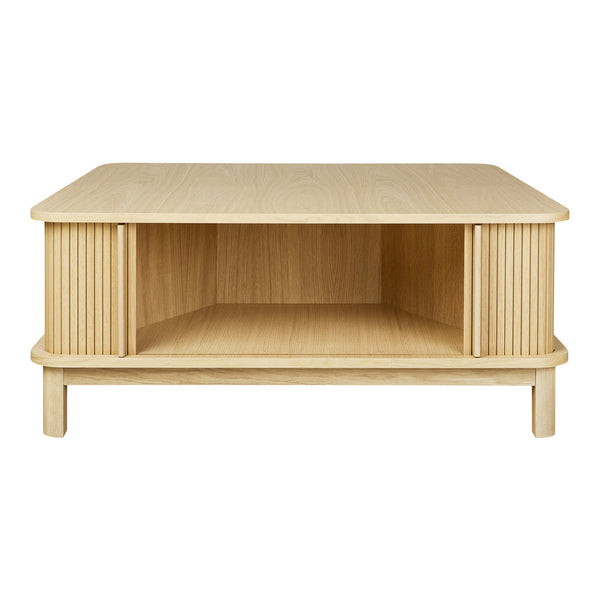 Light oak coffee table with a smooth top and ribbed sides, showcasing natural wood grain patterns.