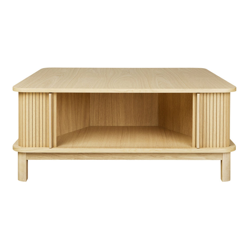 Light oak coffee table with a smooth top and ribbed sides, showcasing natural wood grain patterns.