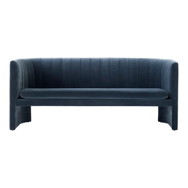 Navy blue sofa with vertical ribbed pattern, featuring a modern, sleek design and minimalist silhouette.
