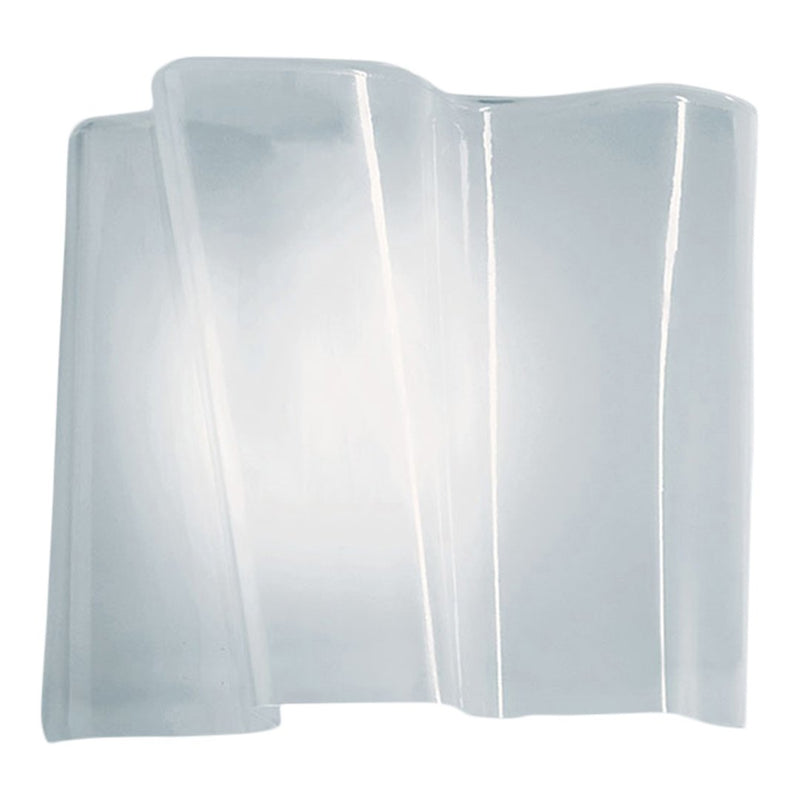 Translucent glass wall sconce with sleek, wavy design in clear color, enhancing modern decor aesthetics.