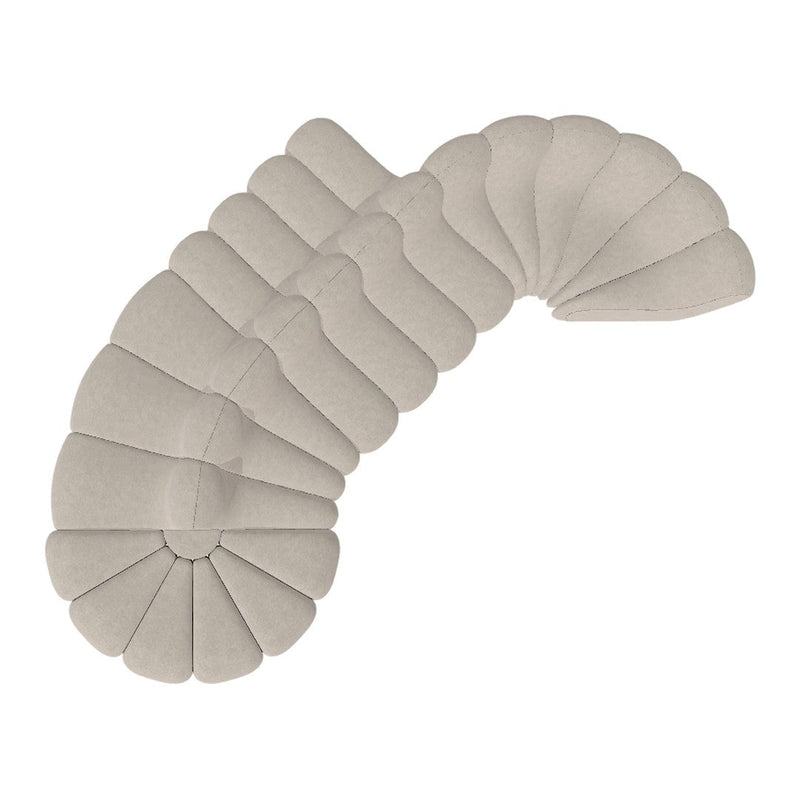 Beige petal-shaped cushion with a soft texture and a layered pattern, ideal for modern home decor.