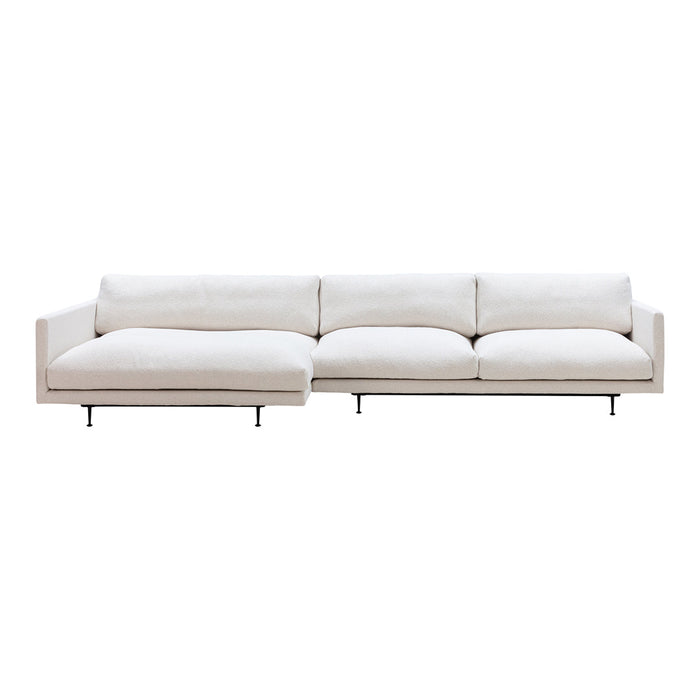 Modern white sectional sofa with clean lines and soft, textured upholstery. Stylish and minimalist design.