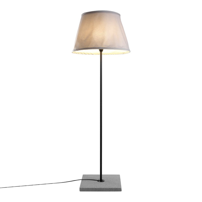 Modern floor lamp with a black base and a soft white fabric shade featuring subtle gray tones.